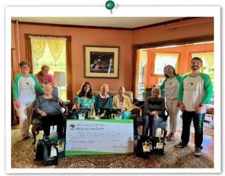 IFS employees with a group of residents from The Girdler House