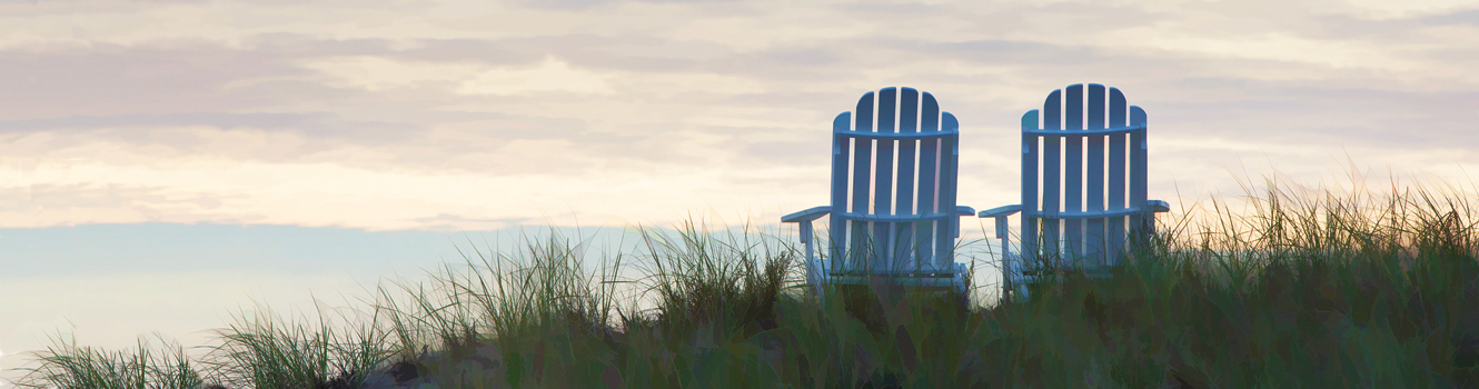 beach chairs on dune