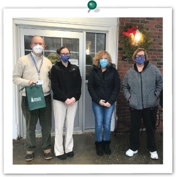 DenMar Rehab  employees receiving gift bags